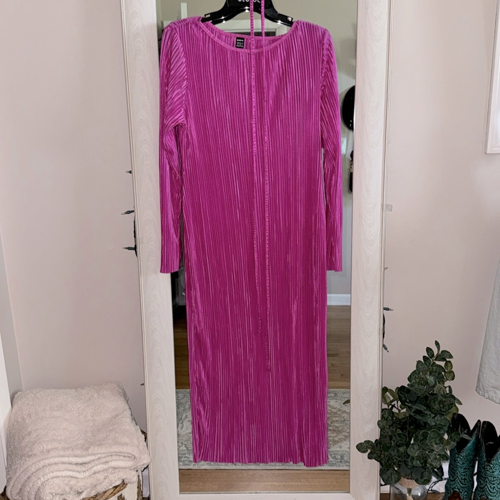pink pleated dress.